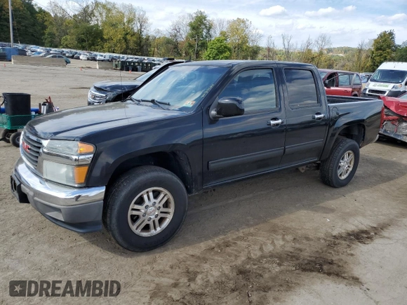 2011 GMC Canyon SLE1 with VIN 1GTH6MFE8B8102114, listed as a Copart auction lot 74137234 with 150,598 mi miles and Salvage title. Bid and sale history available at DreamBid. Image 1.
