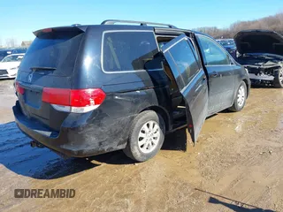 2008 Honda Odyssey EX-L z VIN 5FNRL38758B066638, wystawiony jako IAAI lot #41664349 z przebiegiem 134 194 mil mil oraz . Historia ofert i sprzedaży dostępna na DreamBid. Obrazek 4.