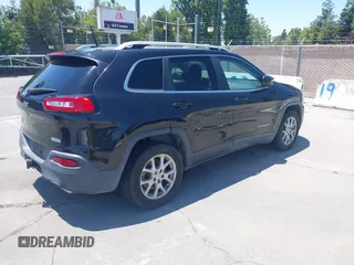2016 Jeep Cherokee Latitude with VIN 1C4PJLCS8GW260180, listed as a IAAI auction lot 42649326 with 207,732 mi miles and . Bid and sale history available at DreamBid. Image 4.