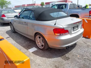2011 BMW 1 Series 128i with VIN WBAUL7C5XBVE87044, listed as a IAAI auction lot 42095602 with 163,049 mi miles and . Bid and sale history available at carsss.com. Image 3.