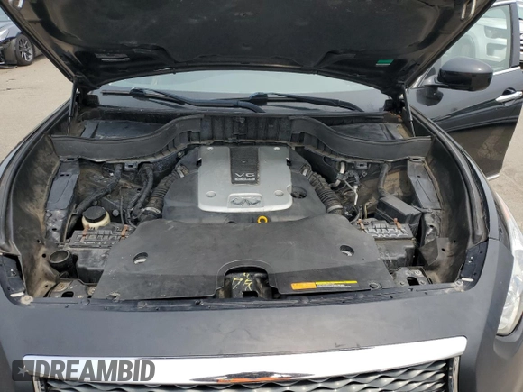 2017 Infiniti QX70 z VIN JN8CS1MW0HM412181, wystawiony jako Copart lot #60594815 z przebiegiem 127 971 mil mil oraz Szkoda całkowita • Salvage title. Historia ofert i sprzedaży dostępna na DreamBid. Obrazek 12.