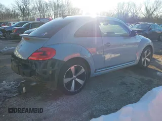 2014 Volkswagen Beetle Turbo R-Line with VIN 3VWVT7AT9EM661347, listed as a IAAI auction lot 41336295 with 61,068 mi miles and . Bid and sale history available at DreamBid. Image 4.