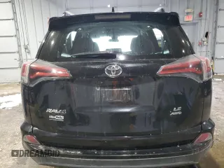 2017 Toyota RAV4 LE with VIN 2T3BFREV7HW601557, listed as a Copart auction lot 46050215 with 128,757 mi miles and Salvage Title. Bid and sale history available at DreamBid. Image 6.