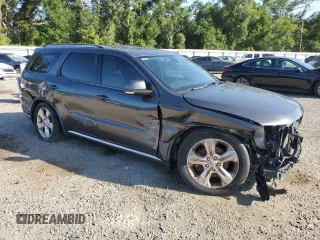 2014 Dodge Durango Limited with VIN 1C4SDHDT3EC344945, listed as a Copart auction lot 60286945 with 131,625 mi miles and Clean title. Bid and sale history available at DreamBid. Image 4.