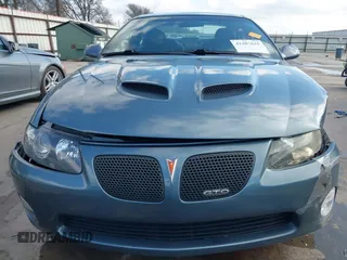 2006 Pontiac GTO with VIN 6G2VX12UX6L561098, listed as a IAAI auction lot 41487635 with 69,741 mi miles. Bid and sale history available at carsss.com. Image 6.