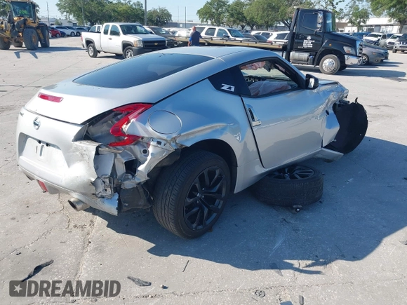 2017 Nissan 370Z with VIN JN1AZ4EHXHM951104, listed as a IAAI auction lot 41992380 with 118,356 mi miles. Bid and sale history available at carsss.com. Image 4.