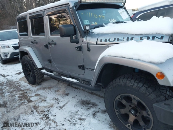 2015 Jeep Wrangler Unlimited Rubicon Hard Rock with VIN 1C4HJWFG1FL659803, listed as a IAAI auction lot 41172485 with 126,881 mi miles. Bid and sale history available at carsss.com. Image 13.