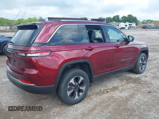 2023 Jeep Grand Cherokee with VIN 1C4RJYB60PC649357, listed as a IAAI auction lot 42707549 with 50,441 mi miles and . Bid and sale history available at DreamBid. Image 4.