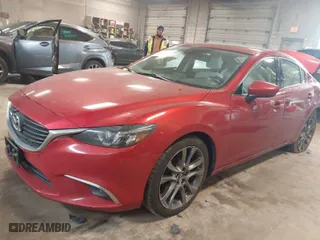 2016 Mazda Mazda6 i Grand Touring with VIN JM1GJ1W5XG1441143, listed as a IAAI auction lot 41232765 with 133,988 mi miles. Bid and sale history available at carsss.com. Image 2.