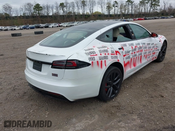2023 Tesla Model S Plaid with VIN 5YJSA1E68PF507197, listed as a IAAI auction lot 42062258 with Not provided miles and . Bid and sale history available at DreamBid. Image 4.