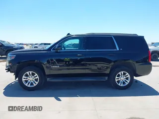 2015 Chevrolet Tahoe LS with VIN 1GNSCAKC5FR645736, listed as a IAAI auction lot 42064623 with 223,149 mi miles and . Bid and sale history available at DreamBid. Image 15.