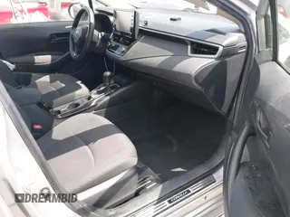 2022 Toyota Corolla Hybrid LE with VIN JTDEAMDE6NJ056705, listed as a IAAI auction lot 42032119 with 197,030 mi miles. Bid and sale history available at carsss.com. Image 5.