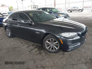 2014 BMW 5 Series 528i with VIN WBA5A5C59ED502669, listed as a IAAI auction lot 42137288 with 241,278 mi miles. Bid and sale history available at carsss.com. Image 1.