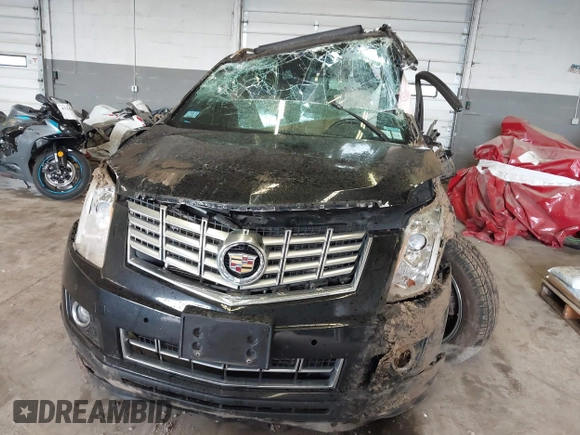 2014 Cadillac SRX Premium Collection with VIN 3GYFNGE35ES636852, listed as a IAAI auction lot 42283604 with 167,983 mi miles and . Bid and sale history available at DreamBid. Image 6.