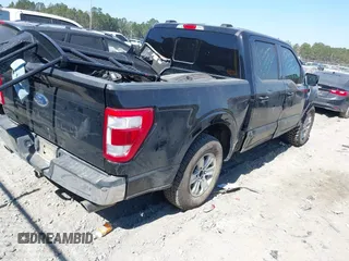 2021 Ford F-150 XL with VIN 1FTFW1E55MFC59394, listed as a IAAI auction lot 41675660 with 90,808 mi miles and . Bid and sale history available at DreamBid. Image 4.