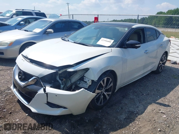 2017 Nissan Maxima S with VIN 1N4AA6APXHC371182, listed as a IAAI auction lot 42596000 with 159,710 mi miles and . Bid and sale history available at DreamBid. Image 2.