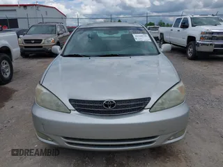 2003 Toyota Camry LE with VIN 4T1BE30K13U168509, listed as a IAAI auction lot 42220735 with 210,328 mi miles and . Bid and sale history available at DreamBid. Image 6.