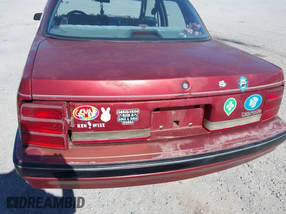 1992 Oldsmobile Cutlass Ciera with VIN 1G3AL54NXN6305928, listed as a IAAI auction lot 41818941 with 107,572 mi miles and . Bid and sale history available at DreamBid. Image 13.