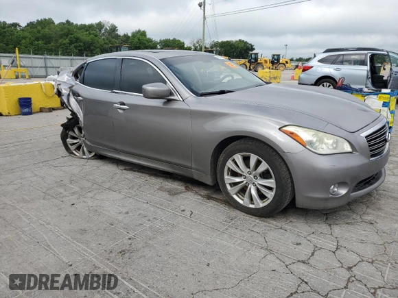 2013 Infiniti M with VIN JN1BY1AR2DM601965, listed as a Copart auction lot 62014215 with 134,047 mi miles and Salvage title. Bid and sale history available at DreamBid. Image 4.