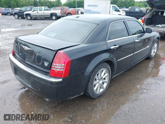 2006 Chrysler 300 C z VIN 2C3LA63H66H412270, wystawiony jako IAAI lot #42479868 z przebiegiem 143 476 mil mil oraz . Historia ofert i sprzedaży dostępna na DreamBid. Obrazek 4.