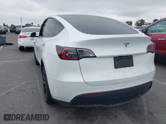 2024 Tesla Model Y with VIN 7SAYGDED6RF166543, listed as a IAAI auction lot 41713362 with Not Provided miles and . Bid and sale history available at DreamBid. Image 3.