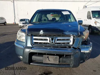 2007 Honda Pilot EX-L with VIN 2HKYF18697H540993, listed as a IAAI auction lot 41243560 with 320,290 mi miles and . Bid and sale history available at DreamBid. Image 12.