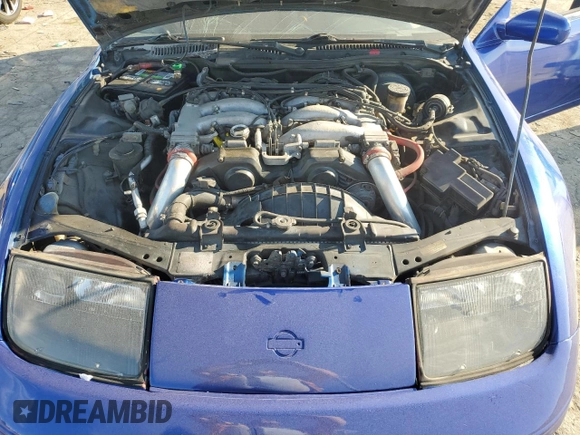 1993 Nissan 300ZX z VIN JN1RZ27H0PX001268, wystawiony jako Copart lot #72682324 z przebiegiem 169 605 mil mil oraz Tytuł czysty. Historia ofert i sprzedaży dostępna na DreamBid. Obrazek 11.