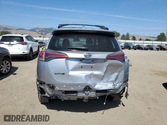 2018 Toyota RAV4 XLE с VIN JTMWFREV5JJ161845, выставлен на аукционе Copart как лот 60572965 с пробегом 85 045 миль миль и Списание • Salvage title. История ставок и продаж доступна на DreamBid. Изображение 6.