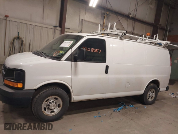 2015 Chevrolet Express Cargo Van with VIN 1GCWGFCF9F1167677, listed as a IAAI auction lot 42018087 with 148,263 mi miles. Bid and sale history available at carsss.com. Image 14.