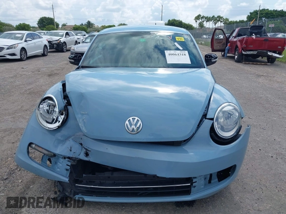 2013 Volkswagen Beetle 2.5L с VIN 3VWJX7AT8DM631449, выставлен на аукционе IAAI как лот 40064318 с пробегом 178 311 миль миль и . История ставок и продаж доступна на DreamBid. Изображение 6.