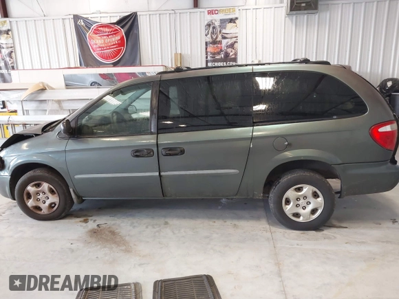 2003 Dodge Caravan SE with VIN 1D4GP24313B191319, listed as a IAAI auction lot 41398477 with 220,083 mi miles. Bid and sale history available at carsss.com. Image 14.