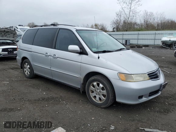 2003 Honda Odyssey EX-L z VIN 5FNRL18983B043014, wystawiony jako Copart lot #52568405 z przebiegiem 194 266 mil mil oraz Czysty tytuł • Clean title. Historia ofert i sprzedaży dostępna na DreamBid. Obrazek 4.