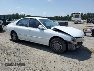 1994 Honda Accord с VIN 1HGCD5642RA166652, выставлен на аукционе Copart как лот 57225365 с пробегом 247 643 миль миль и Списание • Salvage title. История ставок и продаж доступна на DreamBid. Изображение 4.