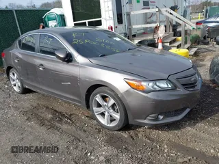 2013 Acura ILX Premium z VIN 19VDE1F54DE001539, wystawiony jako IAAI lot #42015973 z przebiegiem Nie podano mil oraz . Historia ofert i sprzedaży dostępna na DreamBid. Obrazek 1.