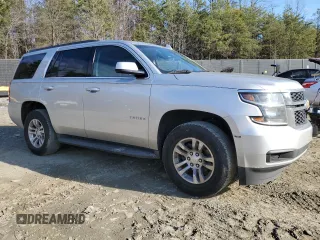 2017 Chevrolet Tahoe LT with VIN 1GNSKBKC2HR113257, listed as a Copart auction lot 86961484 with 158,909 mi miles and Salvage Title. Bid and sale history available at DreamBid. Image 4.