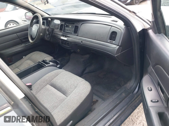 2007 Ford Police Interceptor z VIN 2FAFP71W37X112195, wystawiony jako IAAI lot #41695226 z przebiegiem 140 188 mil mil oraz . Historia ofert i sprzedaży dostępna na DreamBid. Obrazek 5.