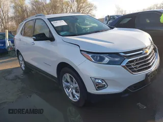 2018 Chevrolet Equinox Premier with VIN 2GNAXVEVXJ6324008, listed as a IAAI auction lot 41877394 with 106,729 mi miles and . Bid and sale history available at DreamBid. Image 1.