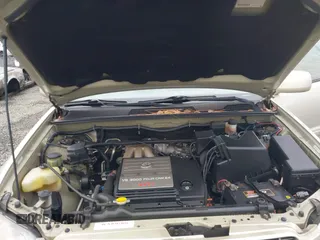 2001 Toyota Highlander z VIN JTEHF21A610039967, wystawiony jako IAAI lot #41512285 z przebiegiem 123 059 mil mil oraz . Historia ofert i sprzedaży dostępna na DreamBid. Obrazek 10.