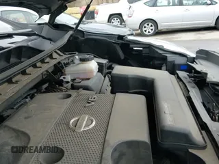 2018 Nissan Murano Platinum z VIN 5N1AZ2MH3JN108084, wystawiony jako IAAI lot #41845604 z przebiegiem 150 069 mil mil oraz . Historia ofert i sprzedaży dostępna na DreamBid. Obrazek 19.