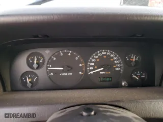 1999 Jeep Grand Cherokee Laredo with VIN 1J4GW58N6XC784679, listed as a Copart auction lot 85345304 with 234,584 mi miles and Salvage Title. Bid and sale history available at carsss.com. Image 9.