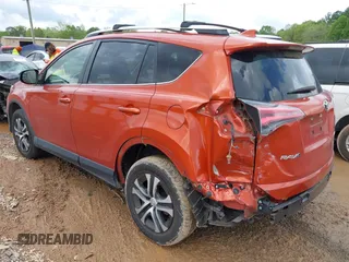 2016 Toyota RAV4 LE with VIN JTMZFREV9GJ074360, listed as a IAAI auction lot 42013611 with 87,578 mi miles. Bid and sale history available at carsss.com. Image 3.