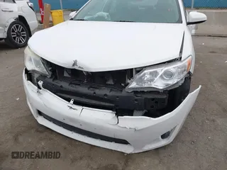 2014 Toyota Camry L with VIN 4T4BF1FK1ER416128, listed as a IAAI auction lot 42030370 with 79,475 mi miles and . Bid and sale history available at DreamBid. Image 6.