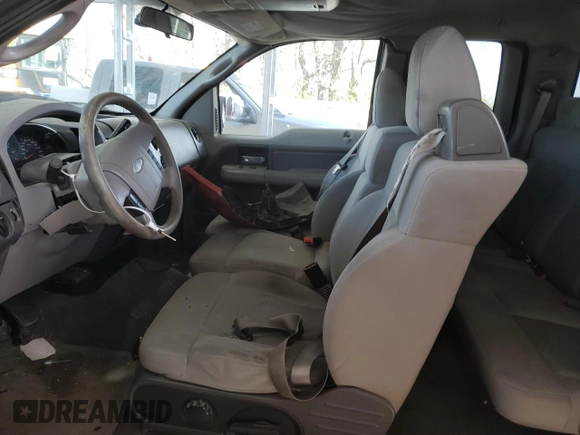 2007 Ford F-150 XL z VIN 1FTPX12V37NA55550, wystawiony jako Copart lot #52700325 z przebiegiem 219 721 mil mil oraz Szkoda całkowita • Salvage title. Historia ofert i sprzedaży dostępna na DreamBid. Obrazek 7.