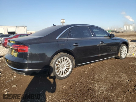2015 Audi A8 L 4.0T with VIN WAU32AFD0FN016733, listed as a Copart auction lot 48564865 with 102,581 mi miles and Salvage Title. Bid and sale history available at carsss.com. Image 3.