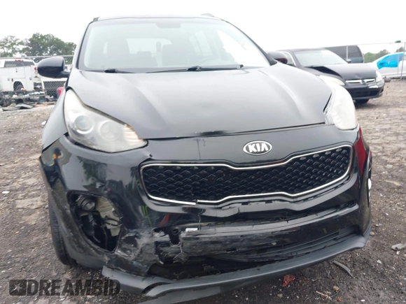 2017 Kia Sportage EX with VIN KNDPN3AC0H7075861, listed as a IAAI auction lot 42343034 with 35,316 mi miles and . Bid and sale history available at DreamBid. Image 6.