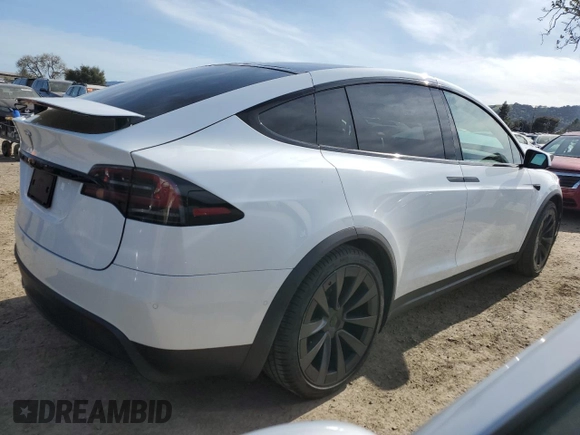 2022 Tesla Model X with VIN 7SAXCBE5XNF358319, listed as a Copart auction lot 50246555 with 12,863 mi miles and Salvage Title. Bid and sale history available at DreamBid. Image 3.
