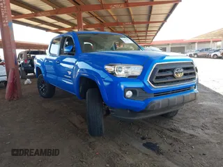 2021 Toyota Tacoma SR5 with VIN 3TMAZ5CN4MM154325, listed as a IAAI auction lot 42288262 with 55,462 mi miles and . Bid and sale history available at DreamBid. Image 1.