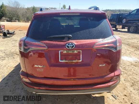 2018 Toyota RAV4 XLE with VIN 2T3WFREV6JW434177, listed as a Copart auction lot 50184895 with 160,942 mi miles and Salvage Title. Bid and sale history available at DreamBid. Image 6.
