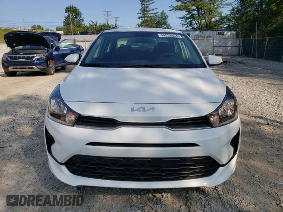 2023 Kia Rio S with VIN 3KPA24AD3PE597752, listed as a Copart auction lot 64836674 with 8,434 mi miles and Salvage Title. Bid and sale history available at carsss.com. Image 5.