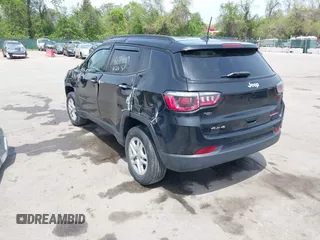 2018 Jeep Compass Sport z VIN 3C4NJDAB3JT245518, wystawiony jako IAAI lot #42094119 z przebiegiem 96 915 mil mil oraz . Historia ofert i sprzedaży dostępna na DreamBid. Obrazek 3.